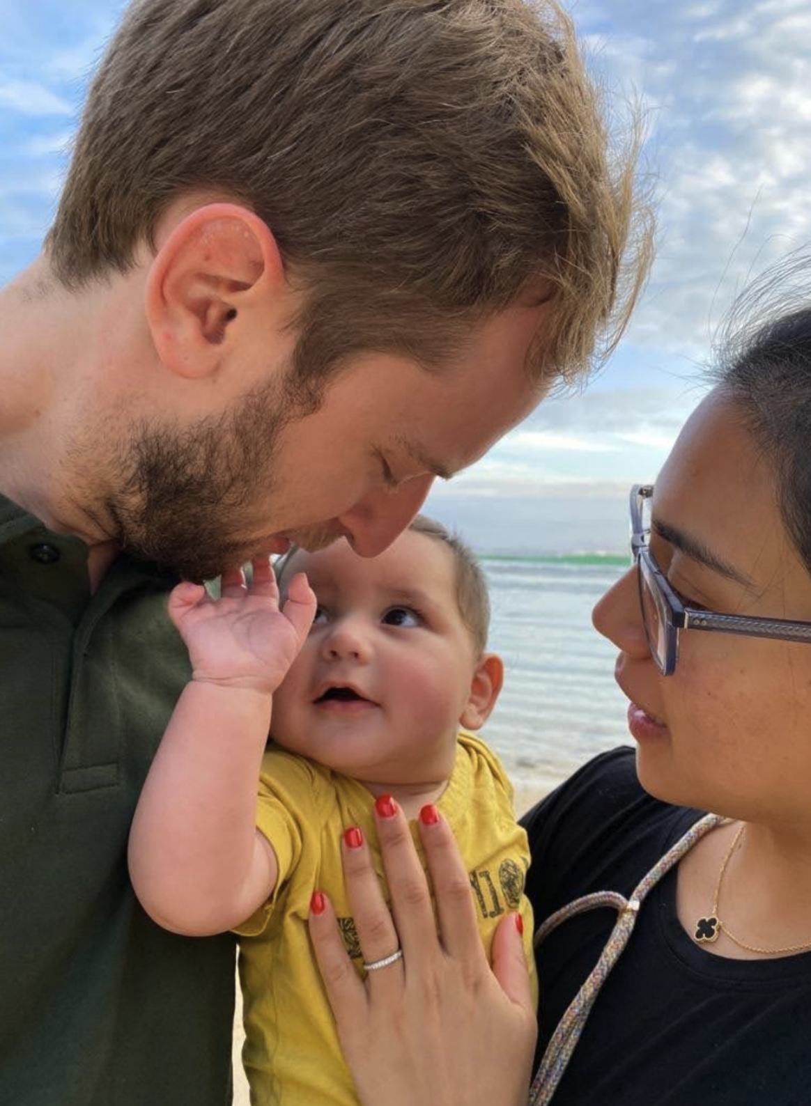 Dr. Freeman with wife and baby son